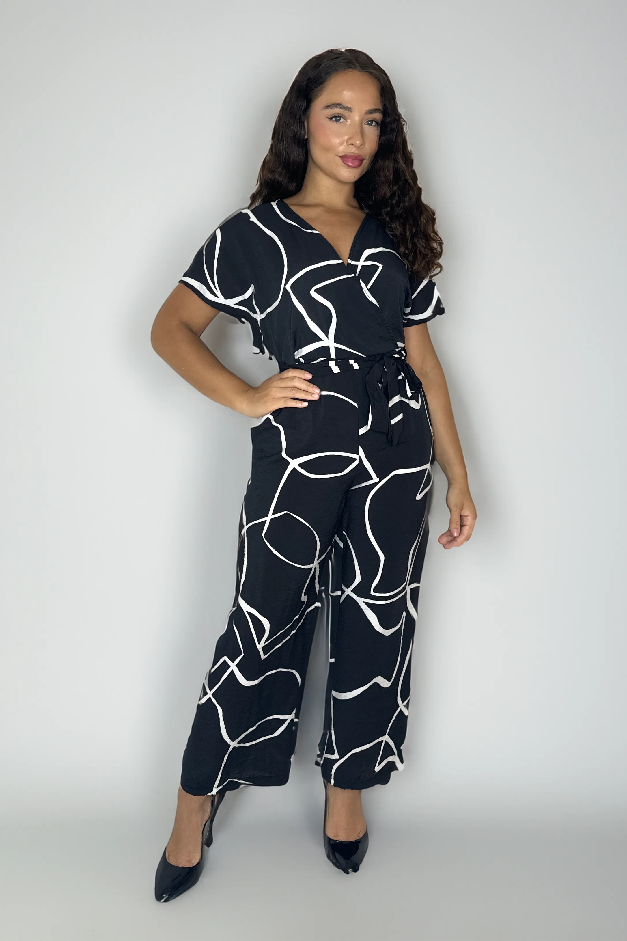 Low-Cut Short Sleeve Tie Waist Straight Leg Viscose Blend All Over Print Jumpsuit